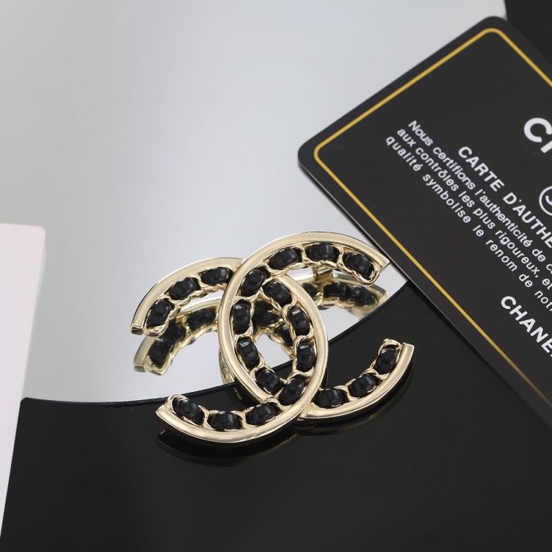 Ch**el brooches